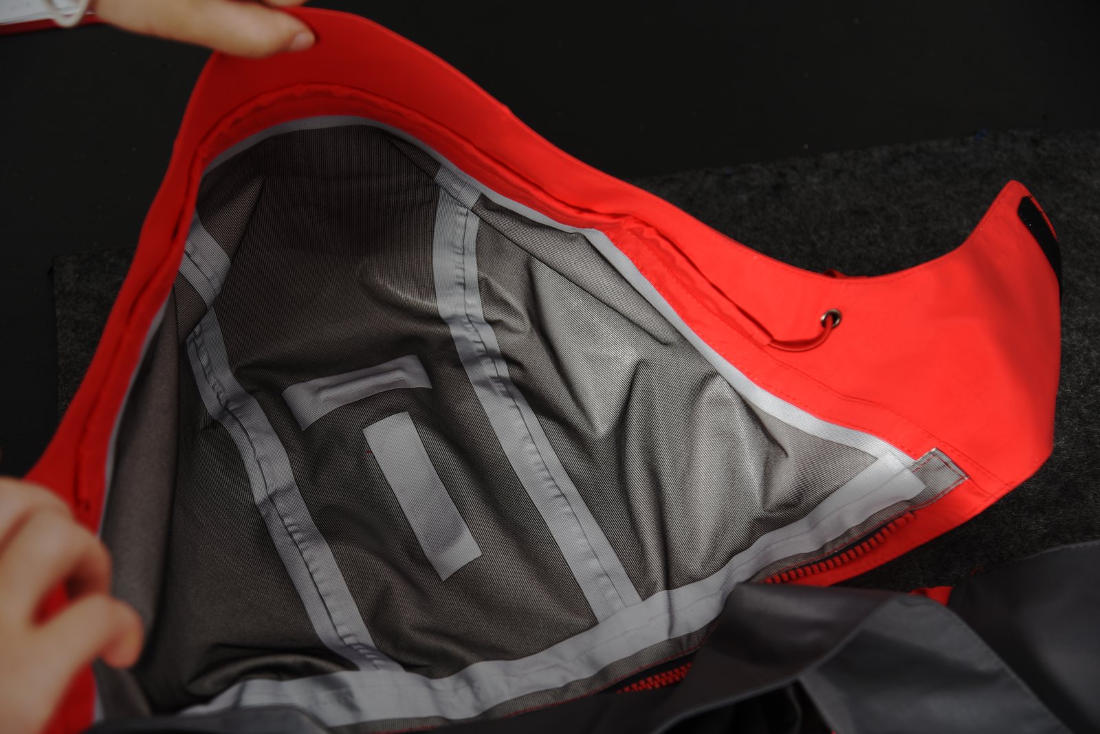 Waterproof shell interior seam construction for OEM outerwear production review