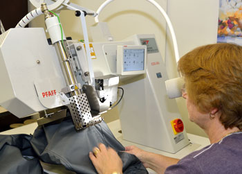 Seam sealing equipment for OEM waterproof outerwear production review